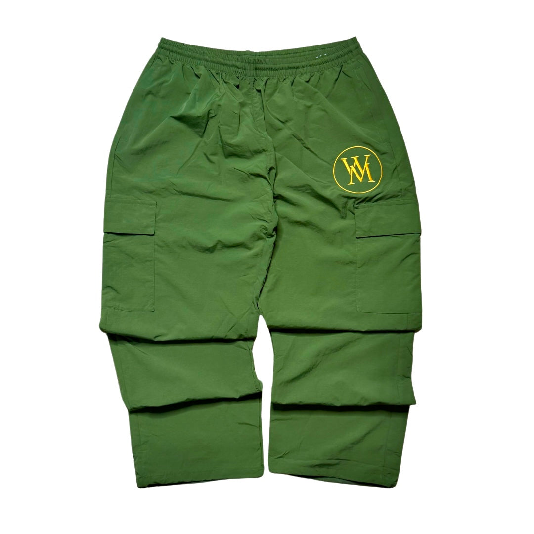 Green Wi35 Mon3y cargo track pants with yellow circular WM logo