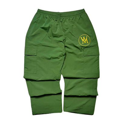 Green Wi35 Mon3y cargo track pants with yellow circular WM logo